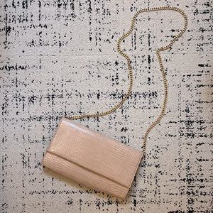 Nude crocodile clutch with detachable gold chain strap